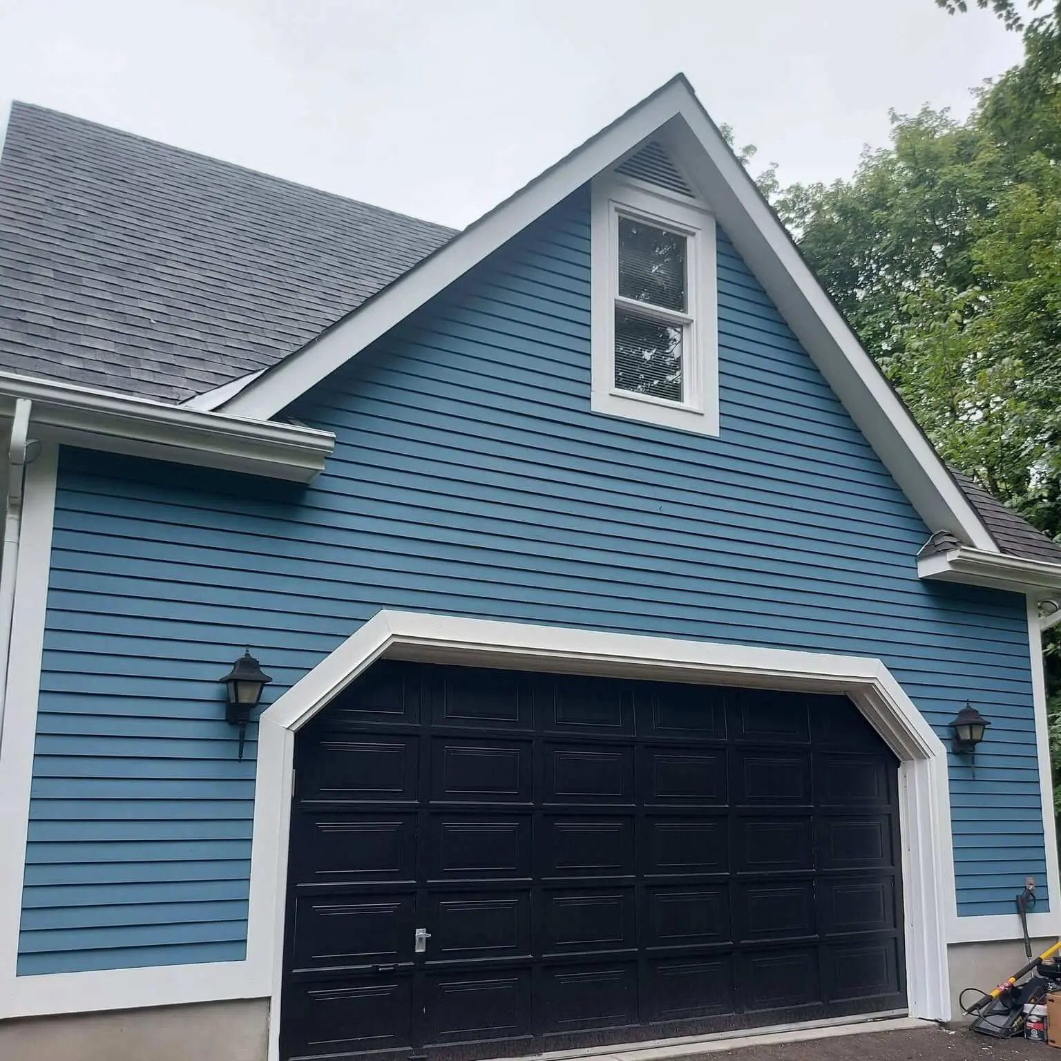light blue home wood siding freshly painted new brunswick saint john painters