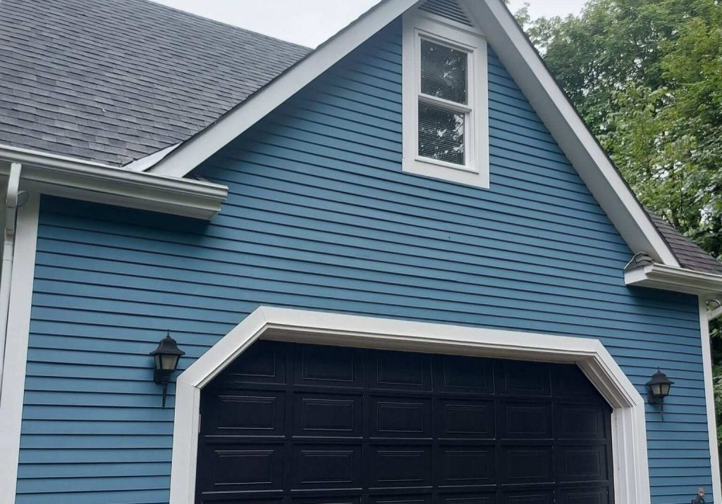light blue home wood siding freshly painted new brunswick saint john painters